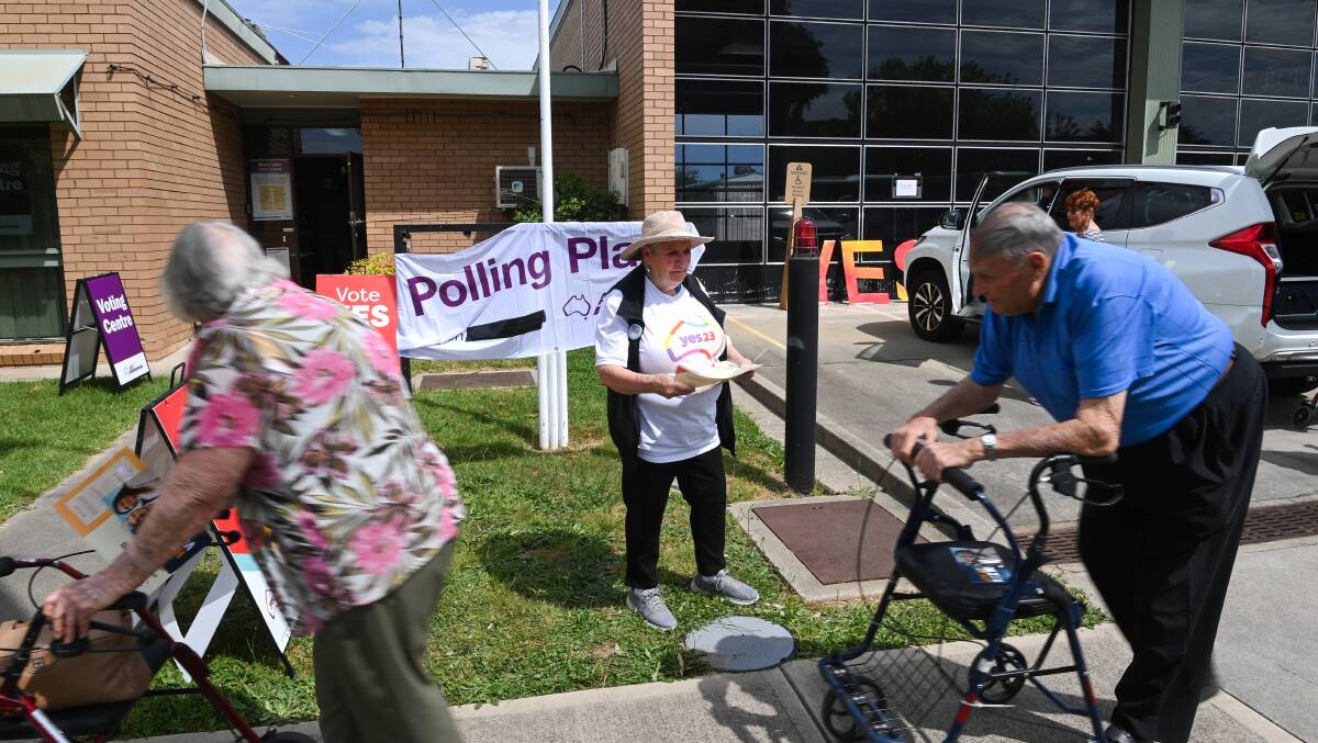 Voters head into the pre-polling hub at what was once Wodonga's fire station. Picture by Mark Jesser