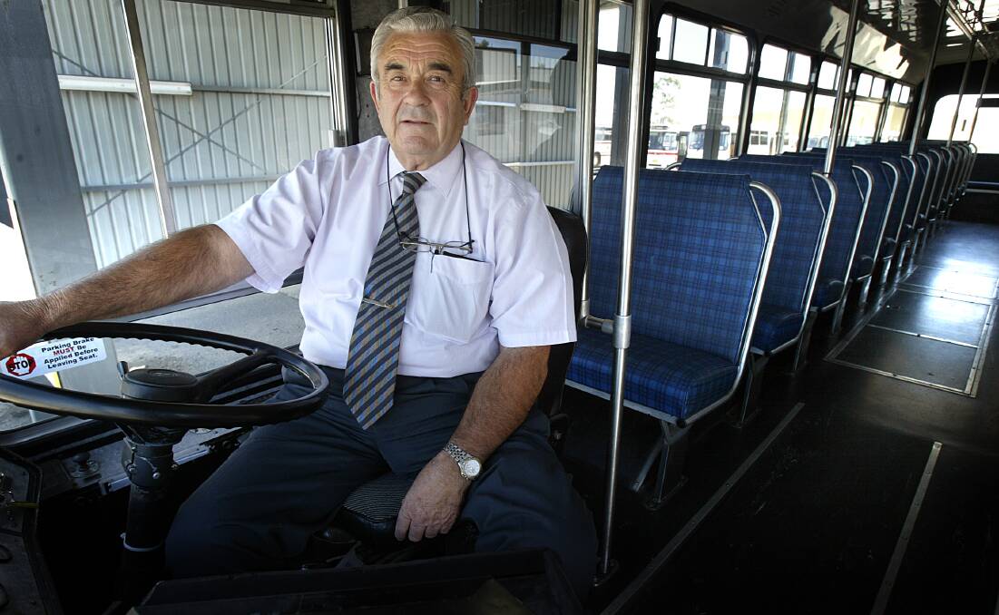Steady hand: Lionel Gillman pictured in 2006 in a Martin's bus. Before joining the Albury company he had routes around Chiltern and from Corowa to Collendina with his firm known as Gillman Coaches. 