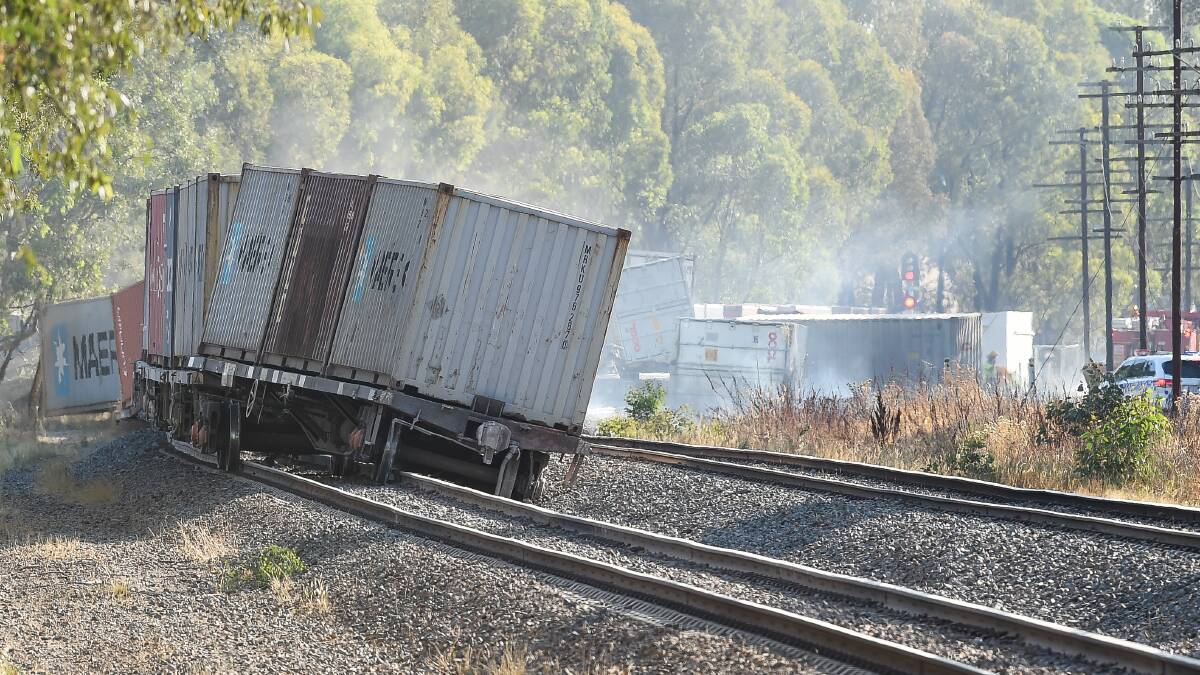 Tilt train: Containers askew after leaving the track the southside of Barnawartha. Picture: MARK JESSER