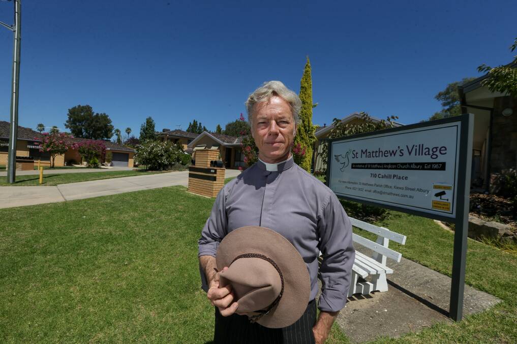 Left shaken: Father Peter MacLeod-Miller at St Matthew's Village where he was confronted by a woman who terrorised residents as she marauded around the 18-unit complex. Picture: TARA TREWHELLA