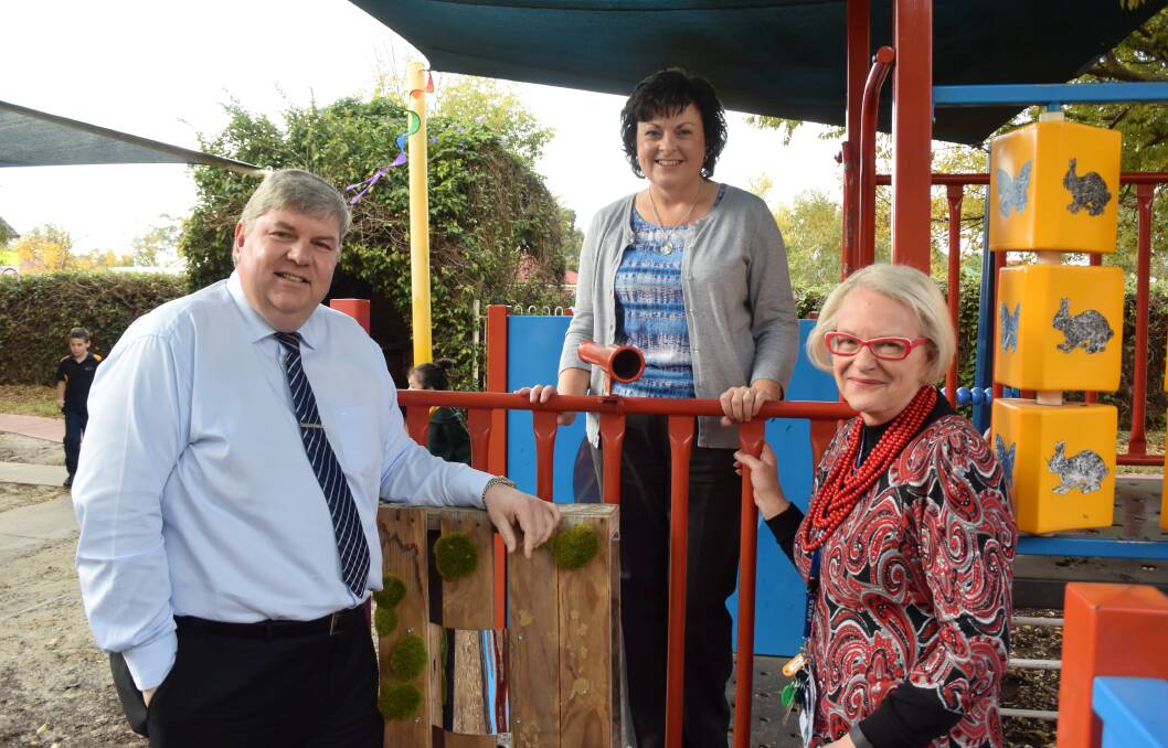 Beneficial relationship: Voucher donors Darren and Julie Eddy and the principal of Albury's Aspect school Jo Gillespie.