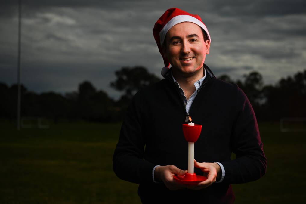 Flame reignited: Wodonga Carols by Candlelight organiser Jacob Mildren in Willow Park which will see a Christmas tradition return after a COVID-enforced online shift. Picture: MARK JESSER