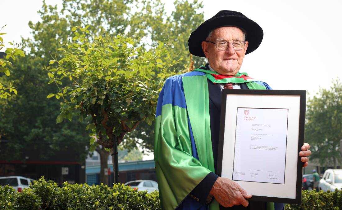Bruce Pennay pictured in 2019 when he received an honorary doctorate from Charles Sturt University. He has now received life membership from the Albury and District Historical Society. Picture by James Wiltshire