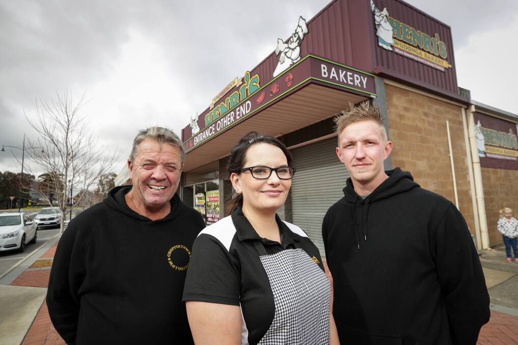 Ready to takeover: New owner Graham Lawrence with managers Bianca and Matt Murphy on the Elgin Boulevard side of Henri's will be opened to the public. 
