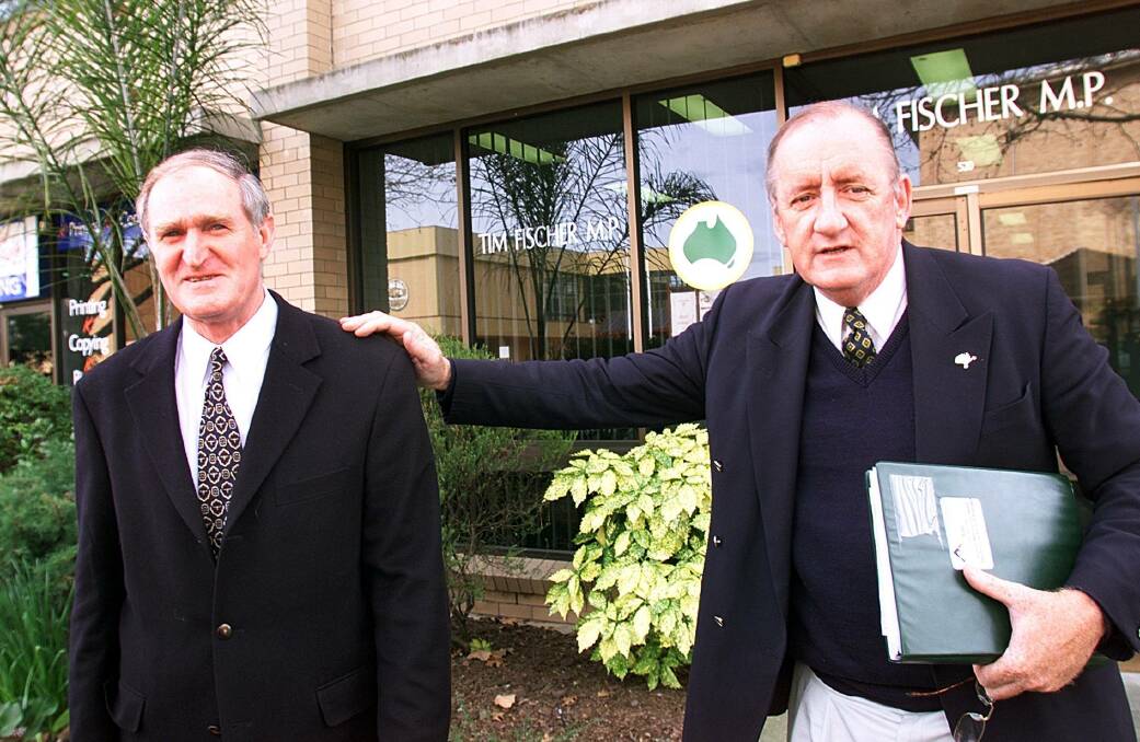 Yesteryear: Then Nationals candidate for Farrer Bill Bott with Tim Fischer outside the latter's electorate office in Swift Street which faced QEII Square. 