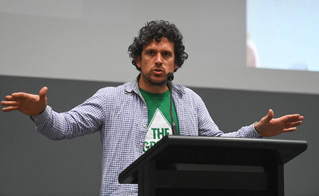 Making a point: Greens candidate Benjamin Gilbert speaks at the election forum, at one point he said humans would be a better species if we moved beyond religiosity. Picture: MARK JESSER 