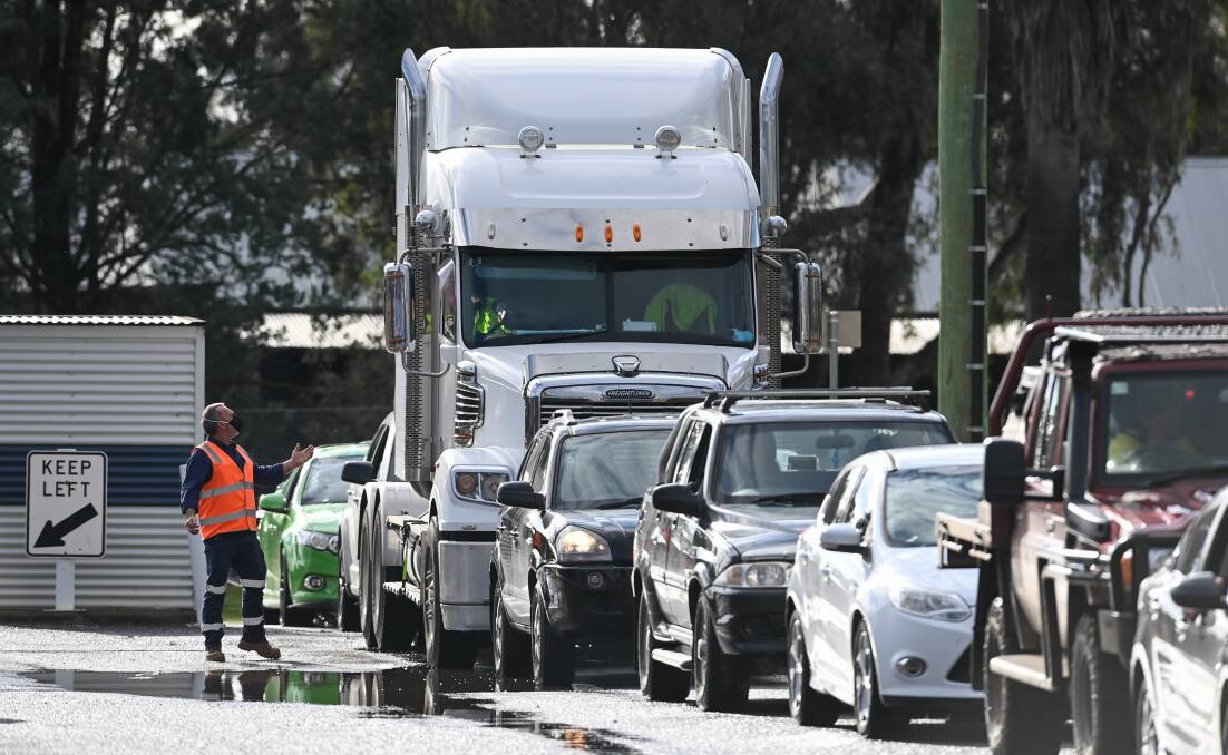 Of vehicles great and small: Motorists line up for COVID testing on the Border. Picture: MARK JESSER