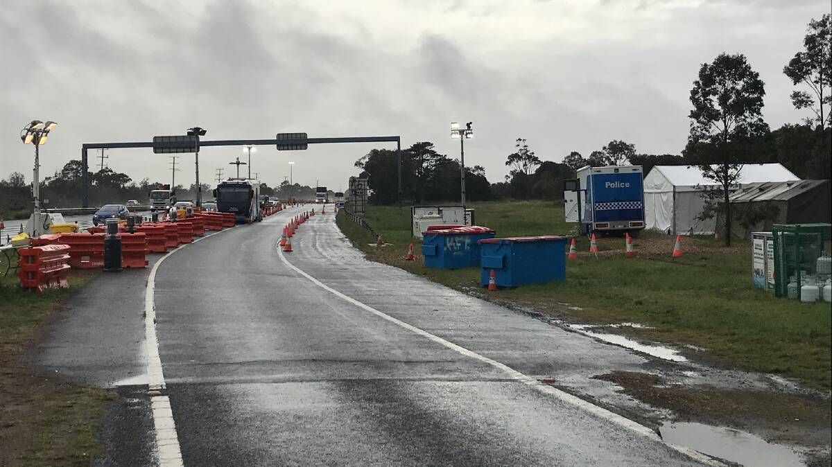 On hold: The Little River checkpoint between Melbourne and Geelong on the Princes Highway when it was unmanned by police because of wet weather on Thursday morning. Picture: TWITTER/NATHAN TEMPLETON