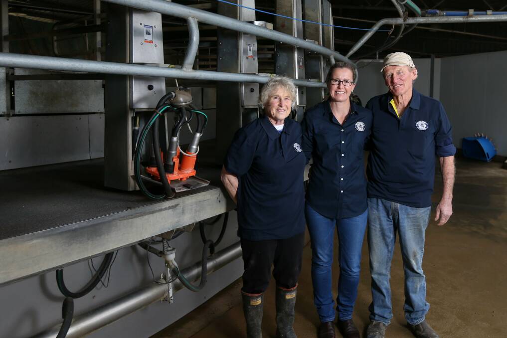 Udder faith: Corowa district dairy farmers Jan and Cliff Twigg join Riverina Fresh manager Sherrene Thompson at their rotary dairy during a visit by the end users of their milk. Picture: TARA TREWHELLA