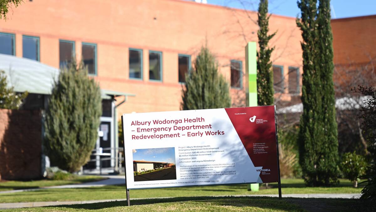 Some progress: A sign has been installed on the East Street side of Albury hospital flagging the redevelopment of the emergency department but a start date is absent. Picture: MARK JESSER