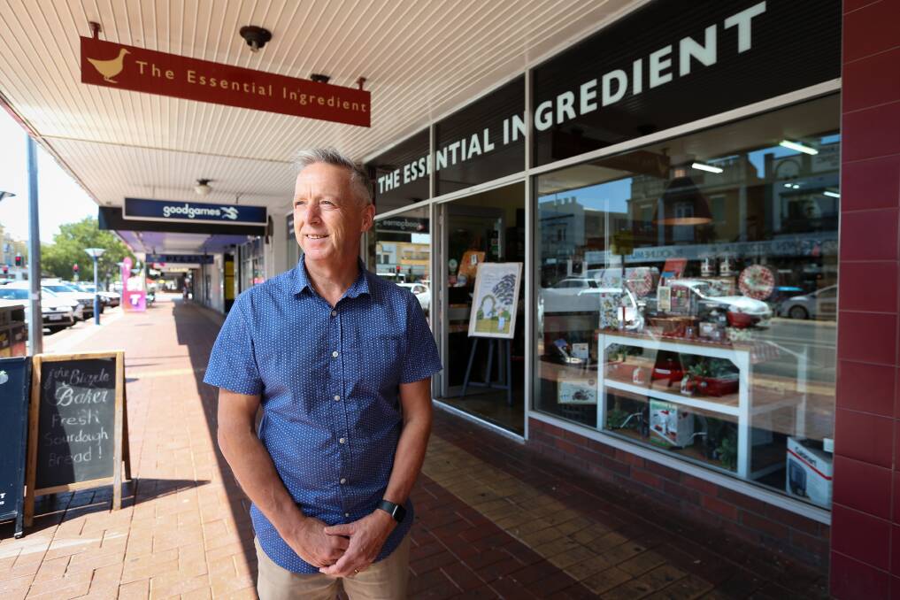 Keeping an eye out: Barry Young outside his homewares shop. Sensors will be installed along Dean Street between Kiewa and David streets as part of a new approach to monitoring car parking in Albury.