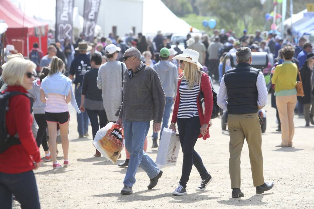 Not this year: Crowds at the Henty Machinery Field Days which will not be staged next month because of complications related to coronavirus. 