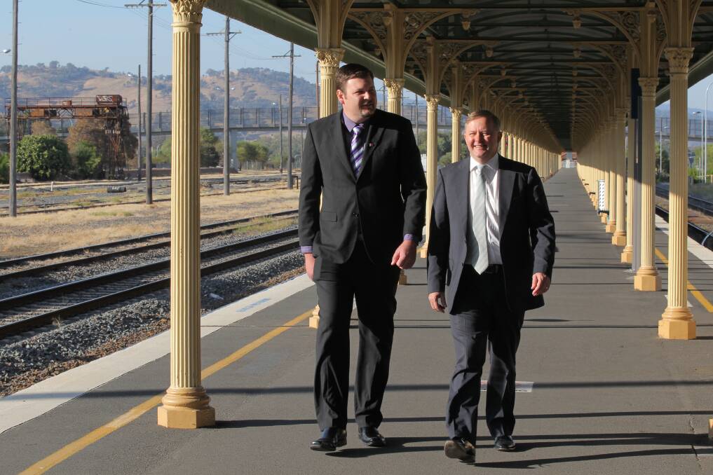 Looking to get back on track: Former Labor election candidate and rail enthusiast Ross Jackson with Anthony Albanese at Albury railway station in 2015 spruiking high speed rail. Mr Albanese will unveil new plans today.