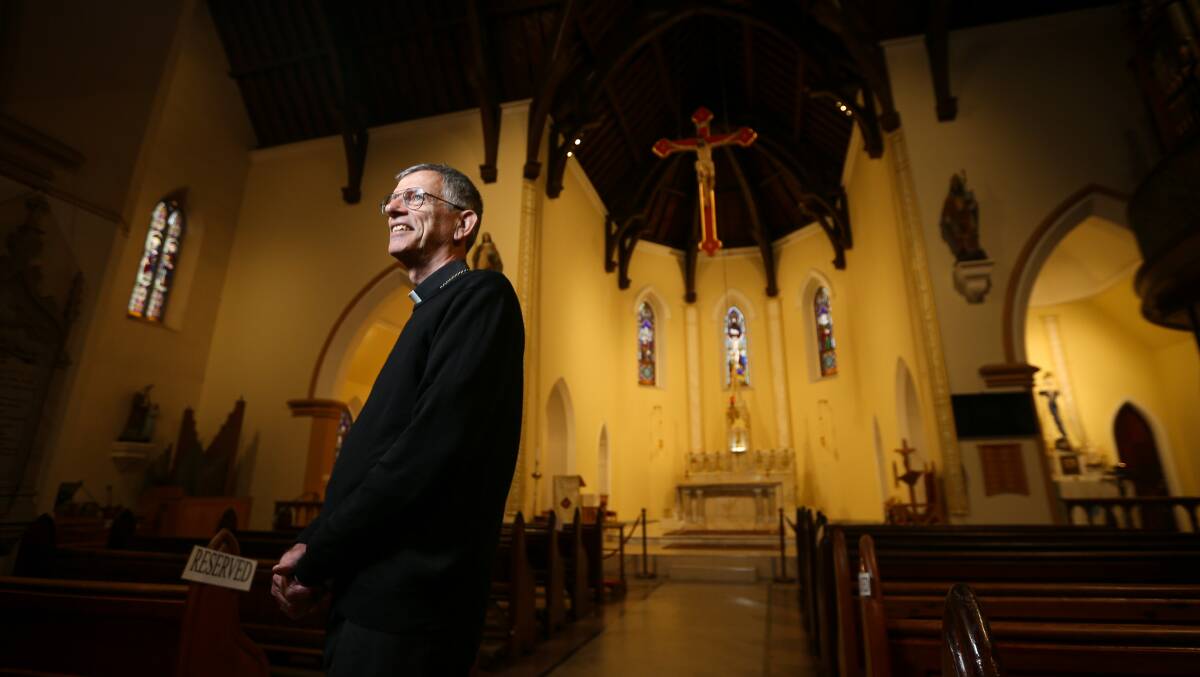 Keen to start: Bishop Mark Edwards in Albury's St Patrick's Catholic Church following his appointment as the new head of the Wagga diocese. He will become the first occupant of that role since 2016. Picture: JAMES WILTSHIRE