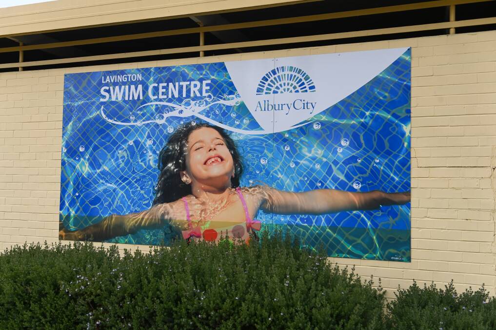 That's new: This large sign on the outside of the Lavington pool is one of the most modern things at the swimming complex which opened in 1966. Former mayor Stuart Baker believes the pool should be replaced. Picture: MARK JESSER