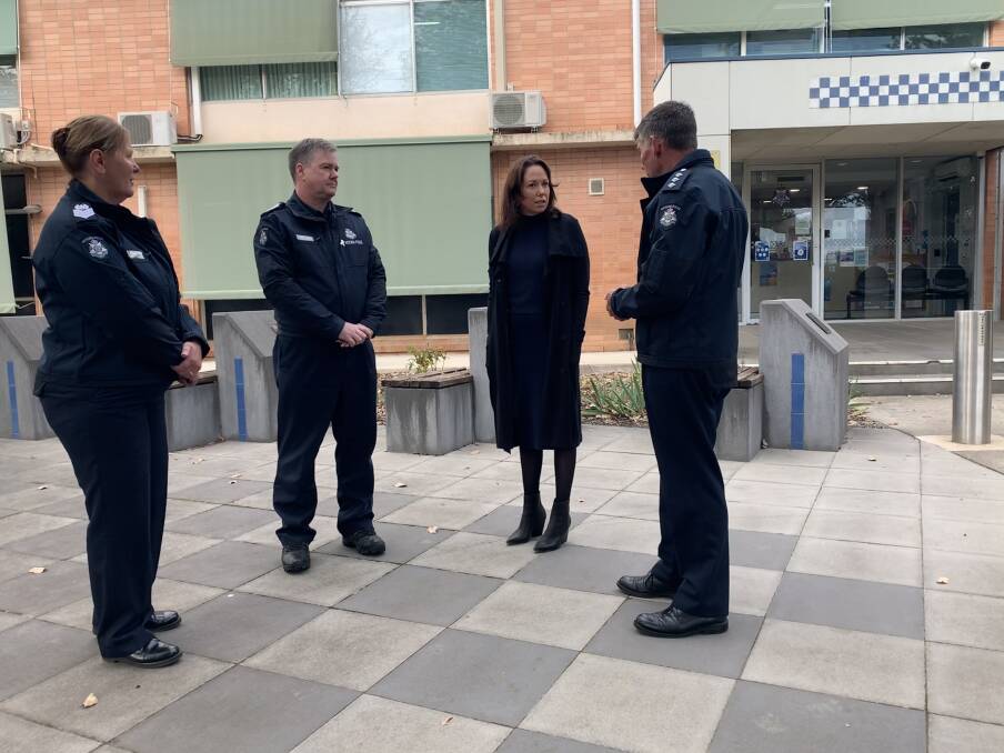 Good news agent: Minister Jaclyn Symes with Senior Sergeant Karlyne Carr, Senior Sergeant Mark Byers and local area commander David Ryan at Benalla's police station.