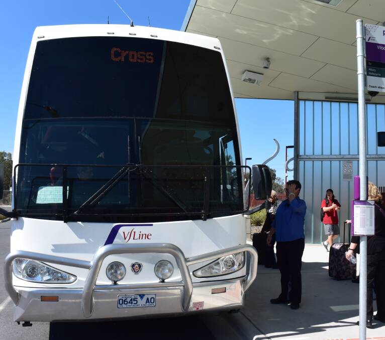 Destination Cross: The bus arrives in Wodonga to take passengers to Melbourne after the train was canned.