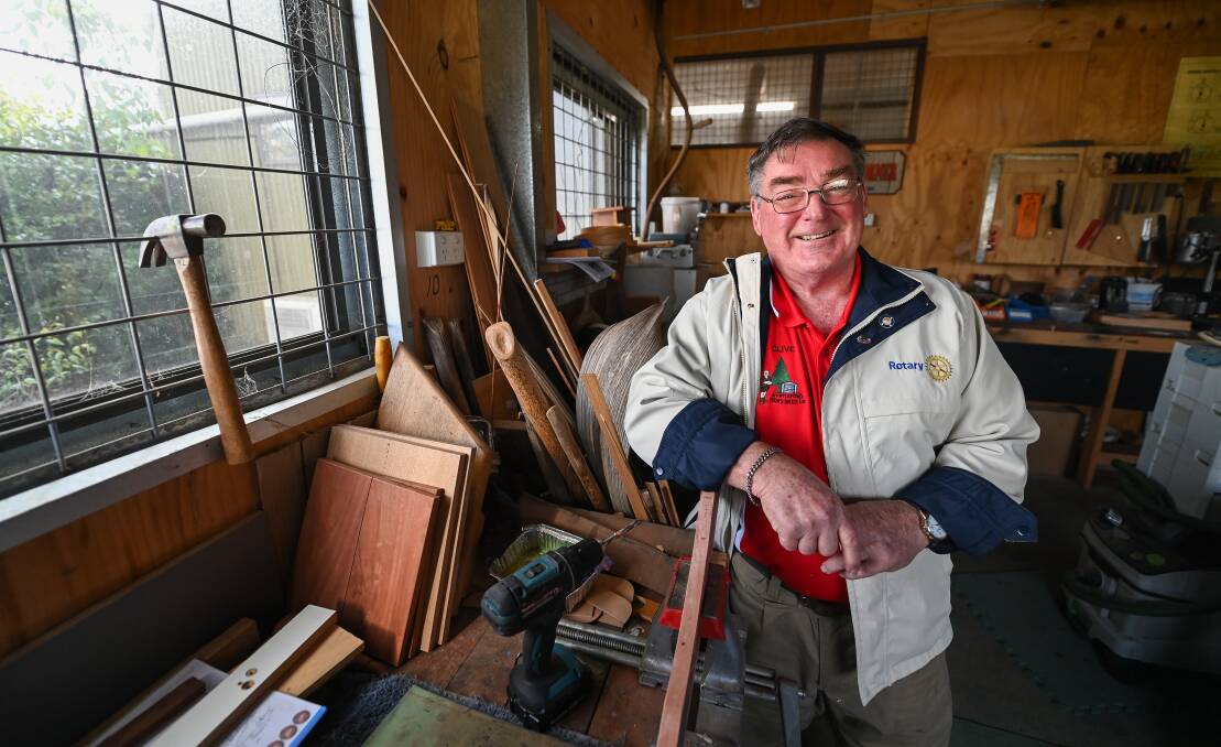 Second home: A Rotary-jacket clad Clive Walker in the Myrtleford Men's Shed. He proposed the site, which is on the town's hospital campus. Picture: MARK JESSER