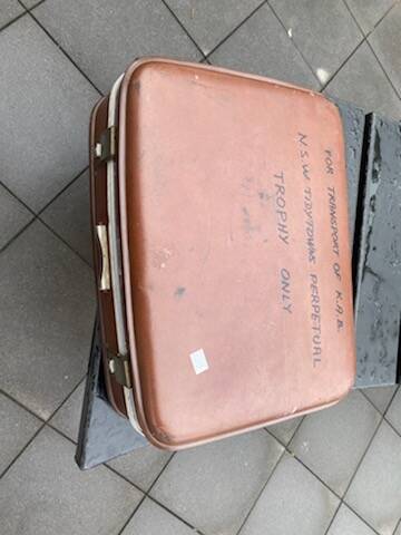 Special container: This long-standing case has the job of carrying around the perpetual trophy which lists Tidy Town winners back to 1981. Albury mayor Kevin Mack helped escort it back to the Border.
