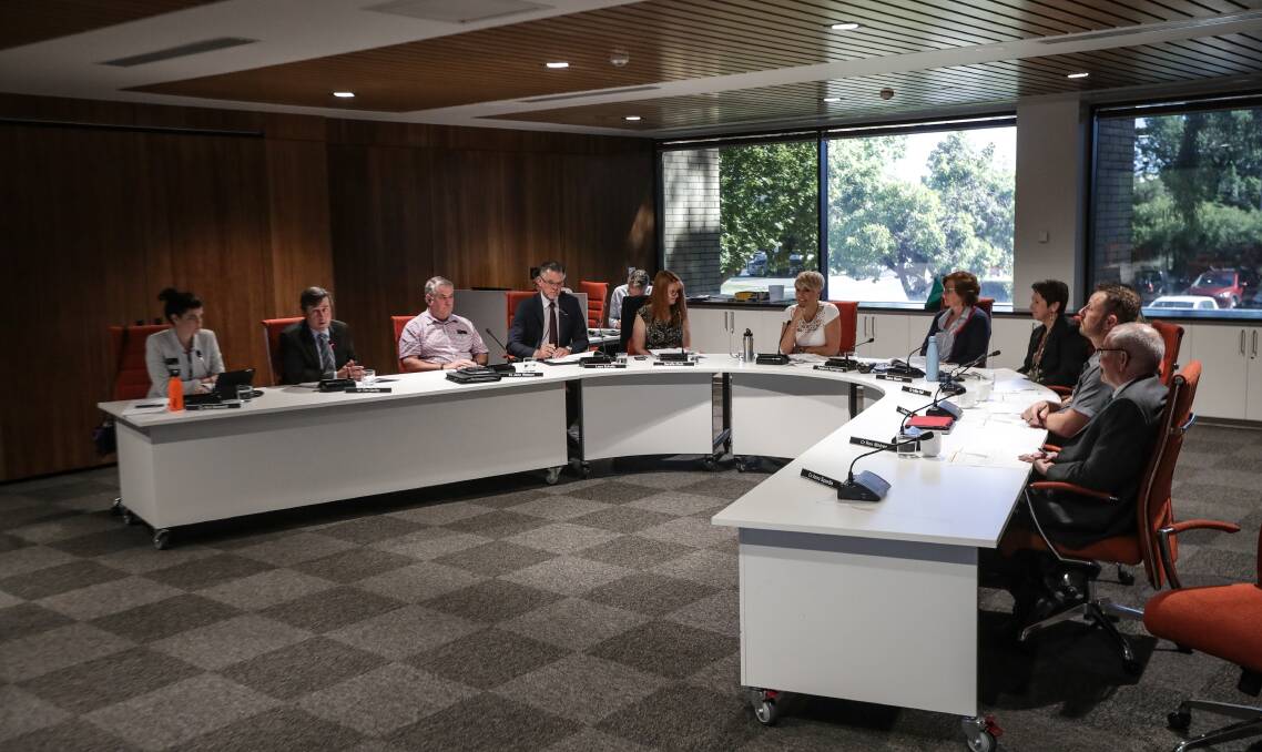 Change coming: Wodonga council chief executive Patience Harrington sits at the apex of the meeting tables with mayor Anna Speedie at Monday morning's gathering which included a discussion about recruiting her replacement. Picture: JAMES WILTSHIRE