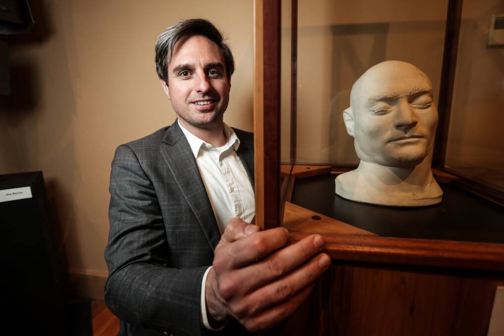 Legacy full of stories: Cameron Auty with a death mask of Ned Kelly. He oversees the Burke Museum which is included in the area up for national heritage listing.