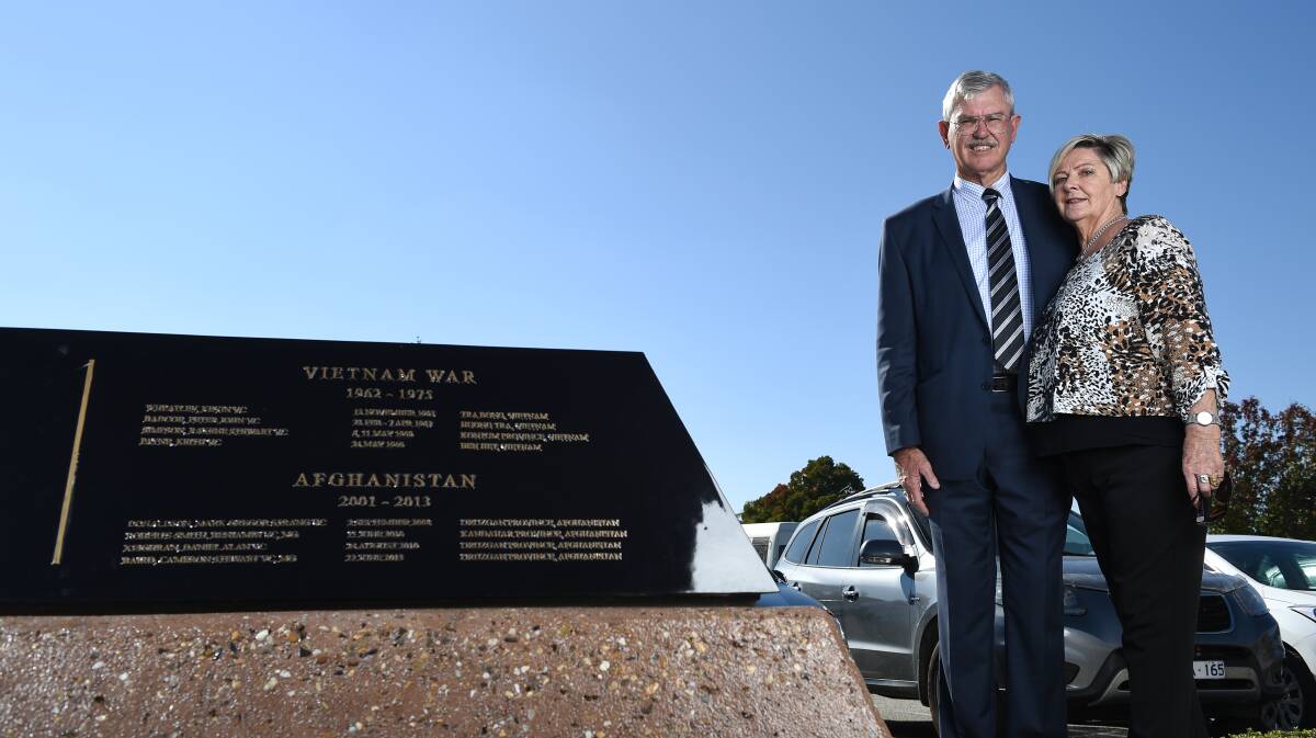 Thankful: Doug and Kaye Baird with the East Albury monument listing their son as a Victoria Cross recipient. Picture: MARK JESSER
