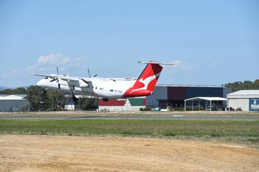 Up in the air: A Qantaslink plane departs Albury airport for Sydney on Friday. Picture: MARK JESSER