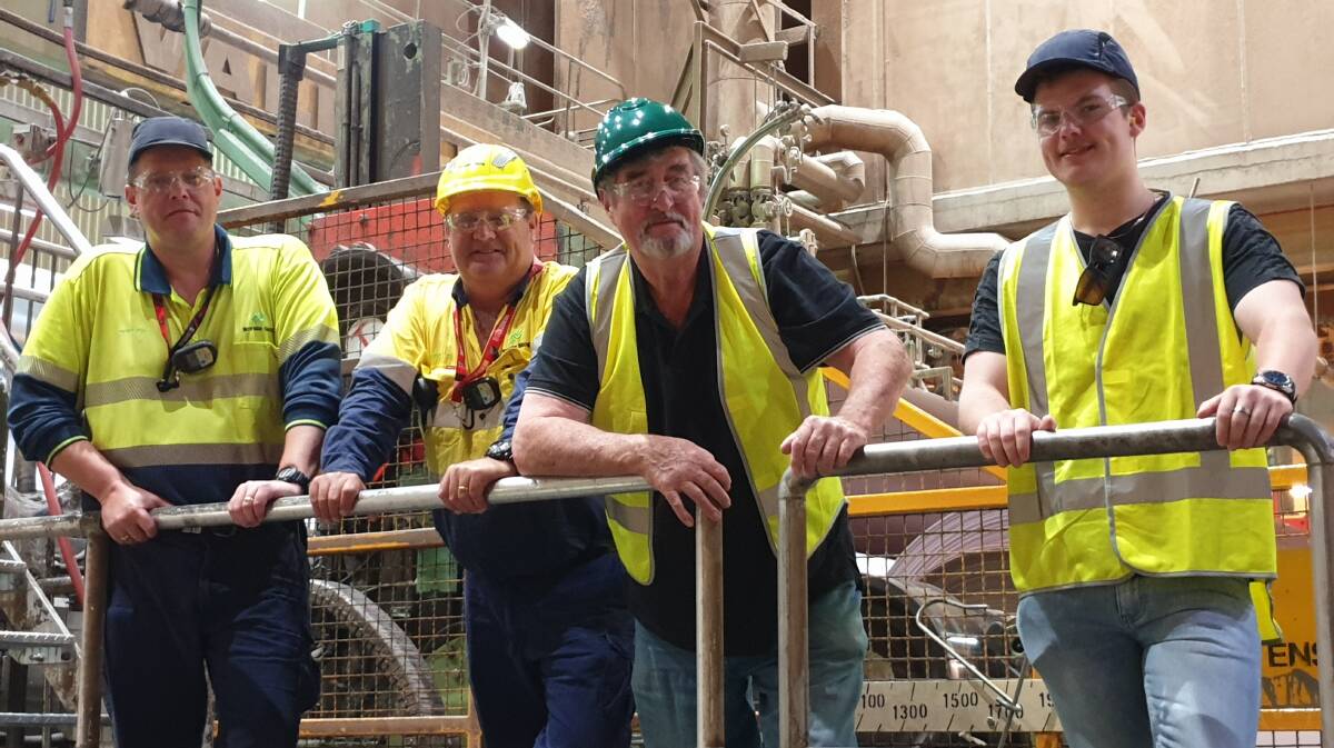 Family affair: David, Hayden, Tony and Lachlan Burles who formed three generations to have worked at the Border's newsprint plant from its opening to closure.