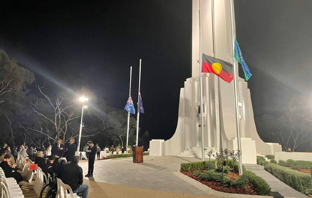 New additions: The Aboriginal and Torres Strait Islander flags fly on Monument Hill on Anzac Day for the first time.