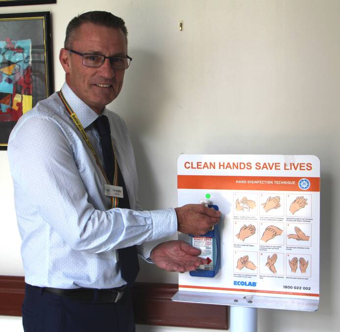 Highly important: Wangaratta hospital acting boss Tim Griffiths demonstrates the need to practice good hygiene to prevent the possible spread of coronavirus.