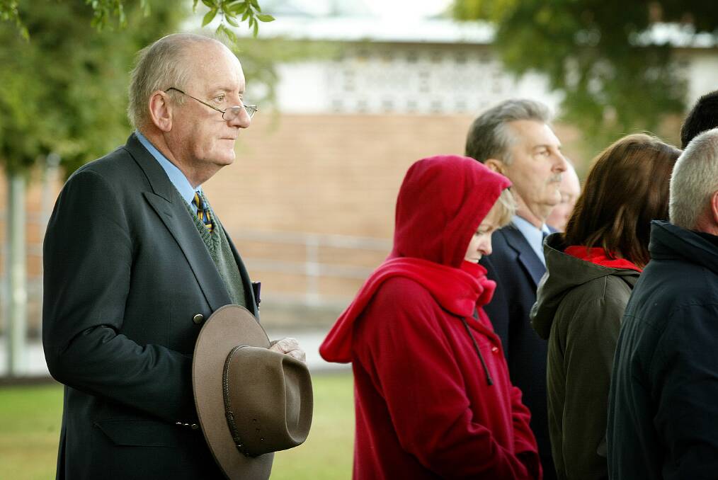 Flashback: Tim Fischer watches an Anzac Day service conducted at the war memorial in QEII Square in 2006.