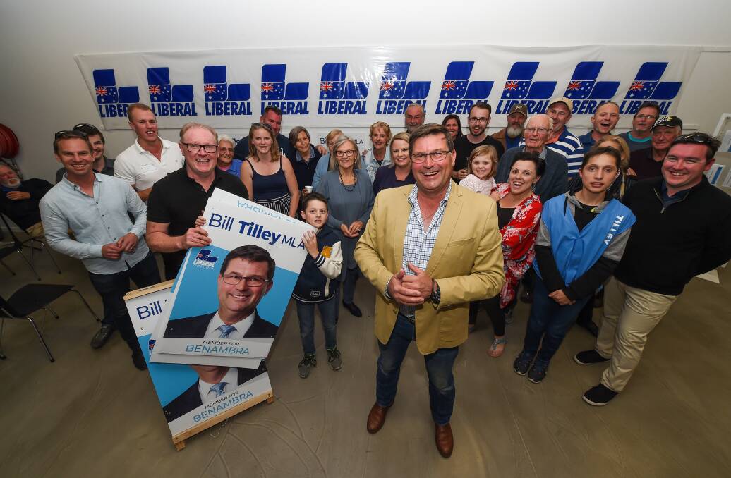 Blue vein: Liberal member Bill Tilley and his supporters and staff enjoy election night at his campaign office in Wodonga's Stanley Street. Picture: MARK JESSER 