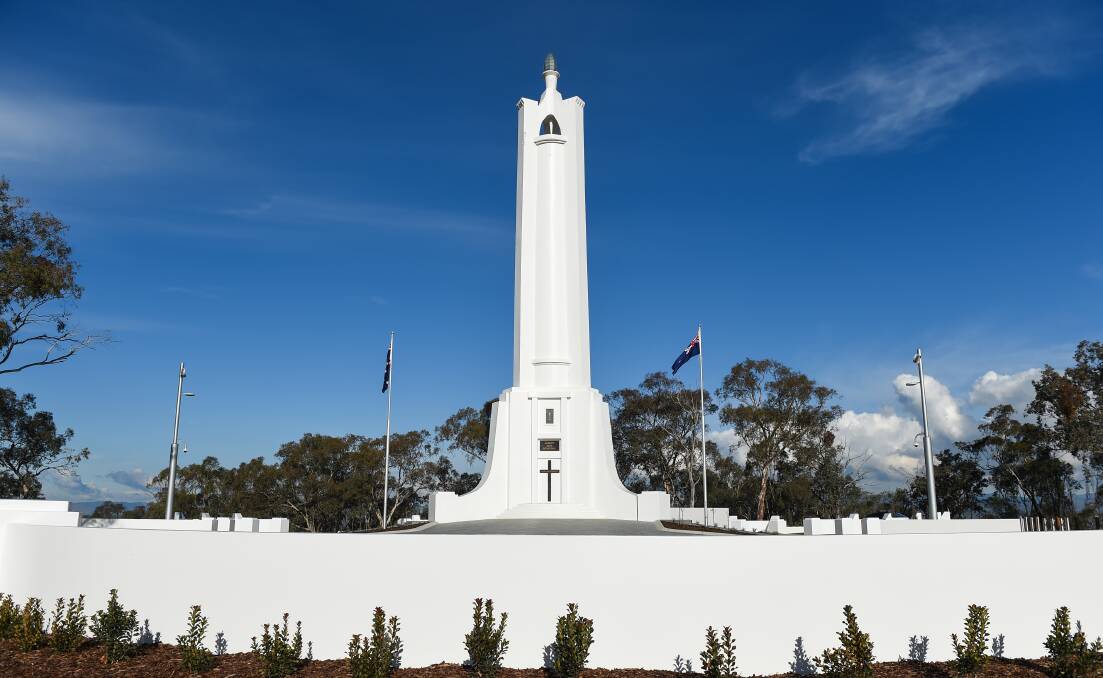 Contentious: The refurbished Albury war memorial has flag poles for the Australian and New Zealand flags and there is a bid to have two more installed to hoist the Aboriginal and Torres Strait Islander flags.