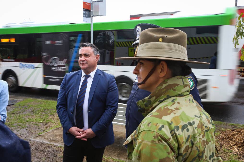 Not on the bus: John Barilaro at the Albury border checkpoint. He appears to travelling separately to the Liberal members of the Coalition with his approach on koalas.