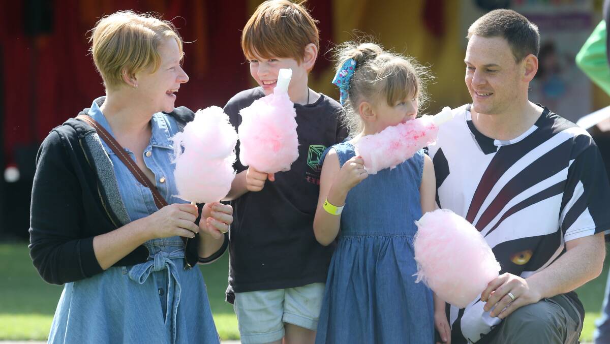Sweet treat: Wodonga's Freund family - Kerri, Kael, Cathryn and Tim snack on some fairy floss. Picture: KYLIE ESLER
