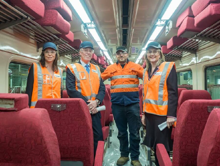 Old becoming new: Jaclyn Symes, V/Line chief executive Gary Liddle, refurbisher George Fattouche and Transport Minister Jacinta Allan aboard one of the North East carriages being upgraded in Melbourne.