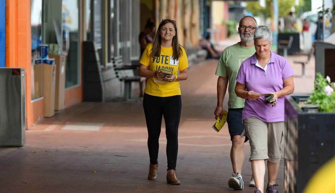 Striding out: Jacqui Hawkins and her Team Yellow supporters will seek to win Benambra at this year's Victorian election after a strong showing in the previous poll.