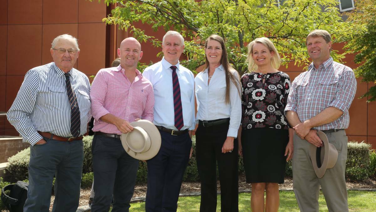 Trumpeting: Griffith mayor John Dal Broi, NSW Water Minister Niall Blair, Deputy Prime Minister Michael McCormack, Nationals senate candidate Perin Davey, Sussan Ley and member for Murray Austin Evans at the announcement of a Griffith MDBA office on Wednesday.
