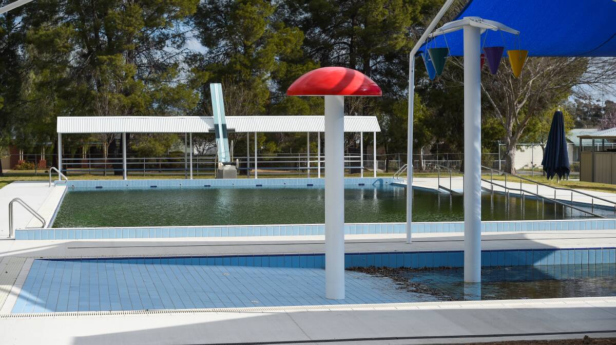 Swimming hole: Greater Hume council has generated a public backlash over its decision to drop the words 'war memorial' from Henty (pictured above) and Holbrook aquatic centres.