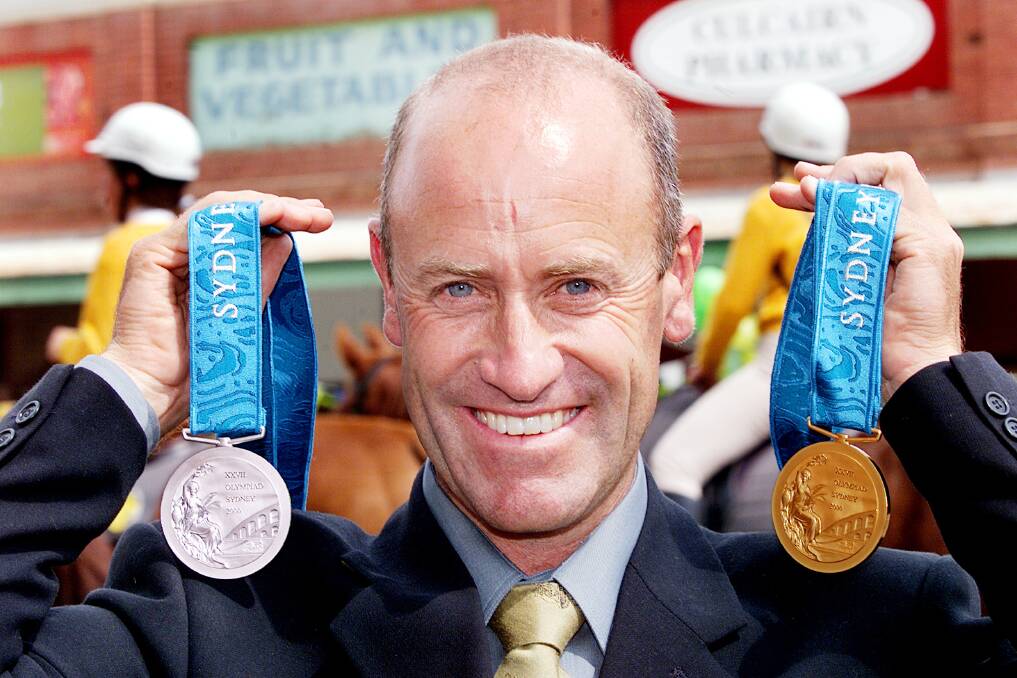 Flashback: Andrew Hoy in the main street of Culcairn after winning silver and gold at the Sydney Olympics in 2000. More than 20 years later he has added another two medals.