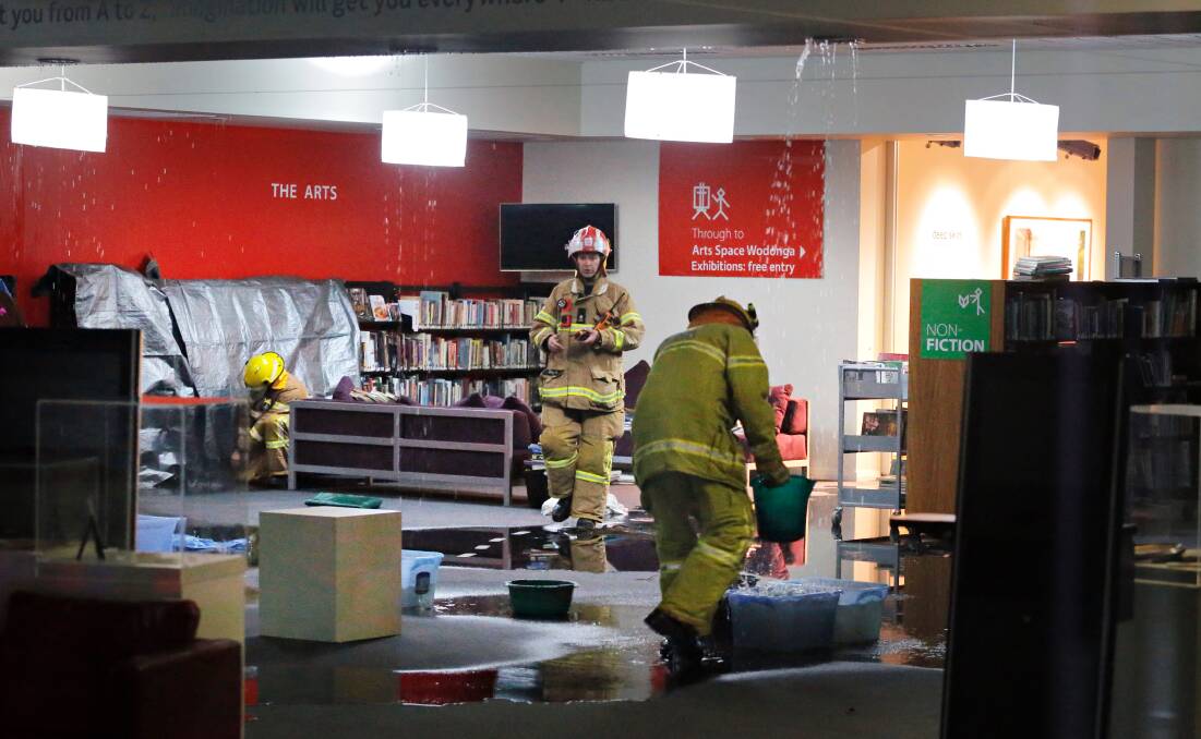 Dramatic day: The limitations of the Wodonga library were highlighted in May 2015 when a downpour saw water pour through the roof of the building, resulting in firefighters being called in.