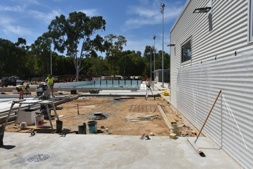 On the job: An area to house tables and chairs looking toward Corowa's new outdoor Olympic pool is prepared. Picture: FEDERATION COUNCIL