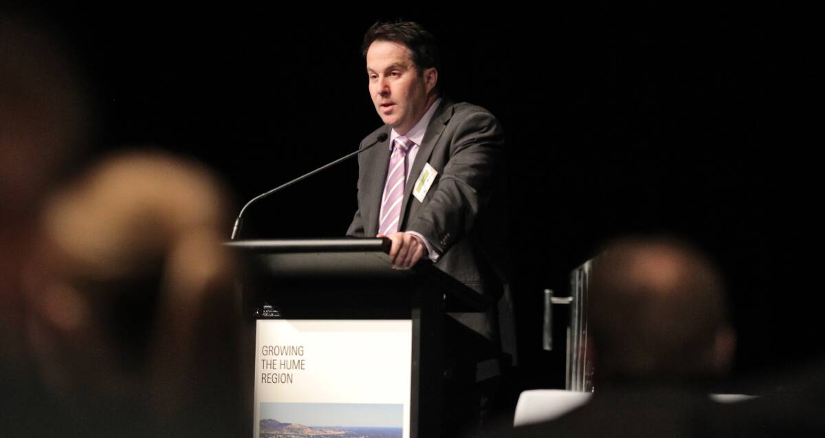 Kicked on: Melbourne Council chief executive Justin Hanney speaking at a conference in Wodonga in 2013, having been at the helm of the Rural City of Wangaratta for four years.