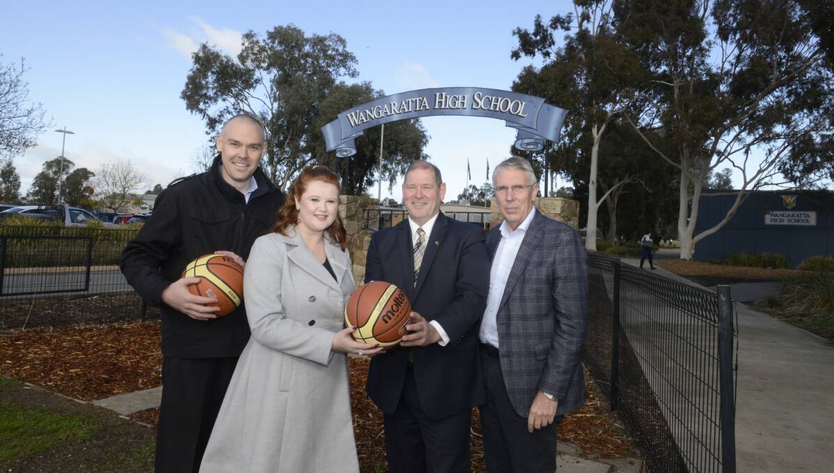 Tip off: Ian Pople, Ashlee Fitzpatrick, Tim McCurdy and Peter Walsh at Wangaratta High School for the promise of $5 million for a new basketball stadium. Picture: WANGARATTA CHRONICLE
