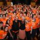Sea of orange: Helen Haines and her family and supporters celebrate her retention of Indi in Saturday's federal election. Picture: JAMES WILTSHIRE