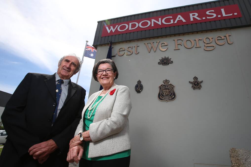 Worthy legacy: Peter White and Cathy McGowan in front of the new display on the wall of the Wodonga RSL to mark the centenary of Armstice Day. Pictures: JAMES WILTSHIRE
