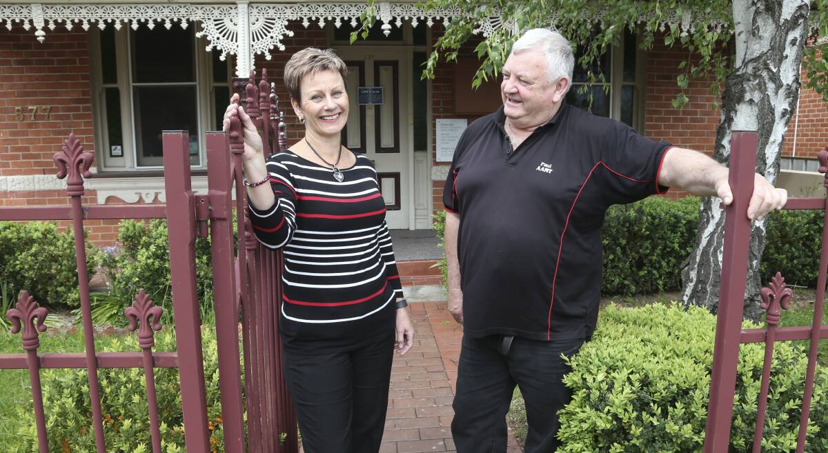 Helping hands: Patient Cindy Ellis with massage therapist Paul Nixon outside his Albury room in Stanley Street. Picture: ELENOR TEDENBORG
