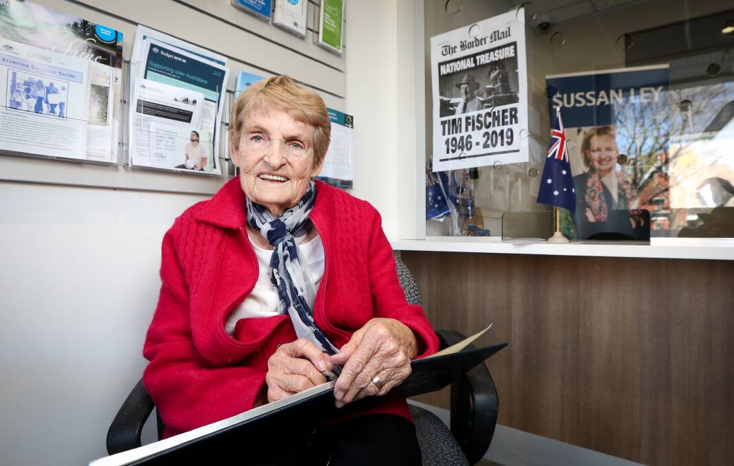Admirer: Culcairn resident Joan Wood signs the book at Sussan Ley's office on Monday afternoon. Picture: JAMES WILTSHIRE