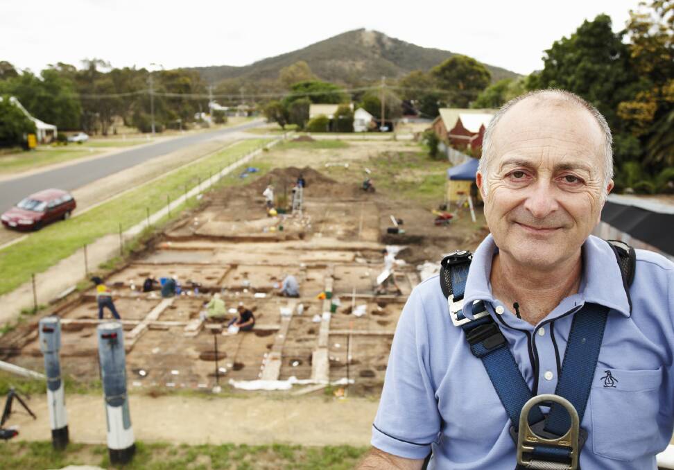 Flashback: Tony Robinson in 2009 at the siege site. The road to the left runs to the bridge across the railway line which is earmarked for replacement as part of the Inland Rail project.