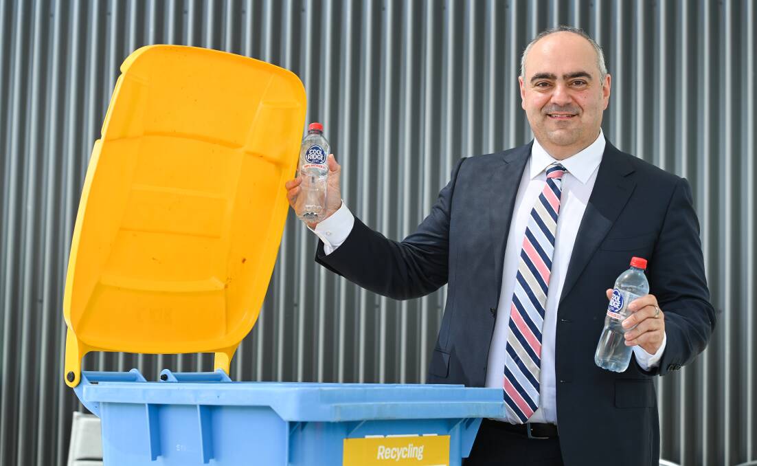 Closing the recycling loop: Asahi Beverages chief executive Robert Ierasi with Cool Ridge-branded water bottles which have been recycled from resin granules. Picture: MARK JESSER